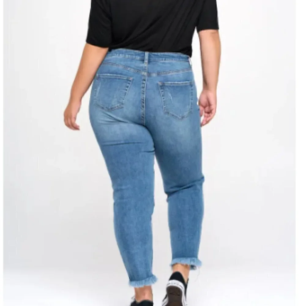 Women’s Medium Wash High Rise Distressed Raw Hem Straight Denim jeans